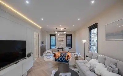 Modern living room with stylish decor and ambient lighting