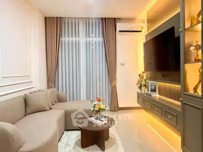 Modern living room with elegant decor and cozy seating area
