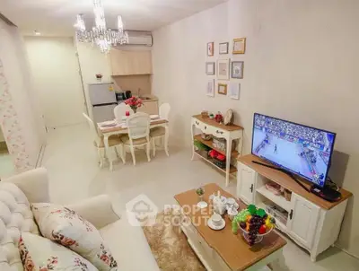 Charming living room with elegant dining area and modern kitchen in cozy apartment.