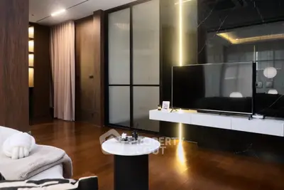 Luxurious modern living room with sleek TV setup and elegant decor