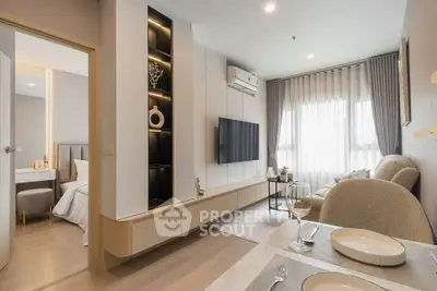 Modern living room with elegant decor and natural light in a stylish apartment.