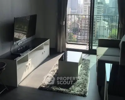 Modern living room with city view, sleek furniture, and balcony access in urban apartment.