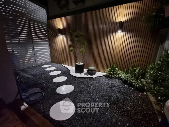 Elegant garden with modern lighting and minimalist design