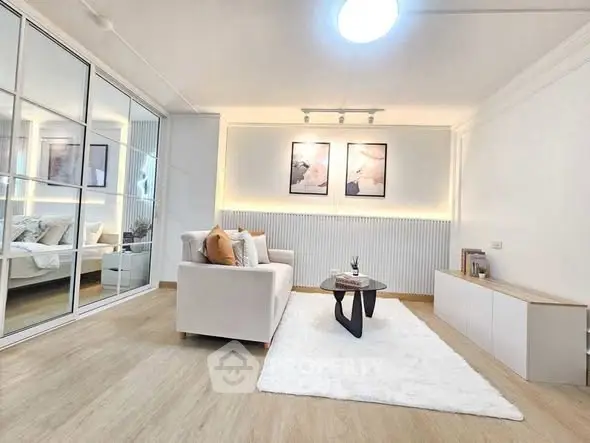 Modern living room with elegant decor and cozy ambiance