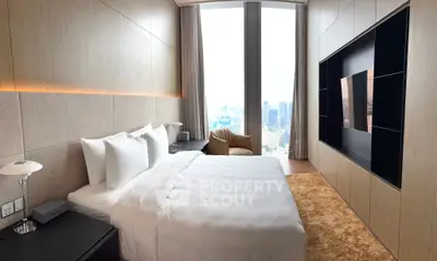 Luxurious bedroom with stunning city view and modern decor