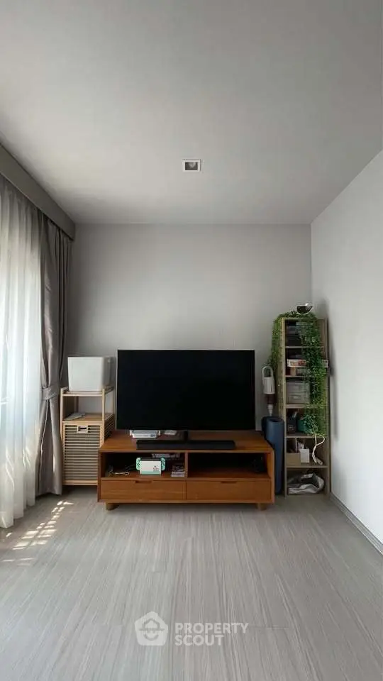 Modern living room with sleek TV setup and stylish decor