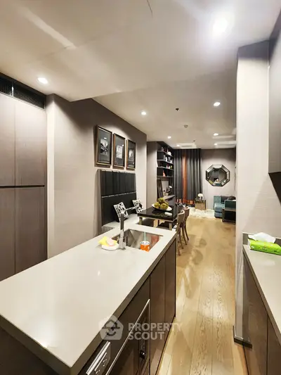 Luxurious open-layout kitchen with modern design and elegant dining area