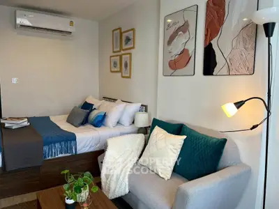 Cozy modern bedroom with stylish decor and comfortable seating area