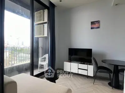 Modern living room with balcony view and sleek furniture