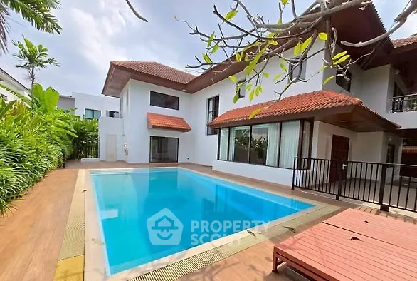 Luxurious villa with private pool and lush garden in tropical paradise