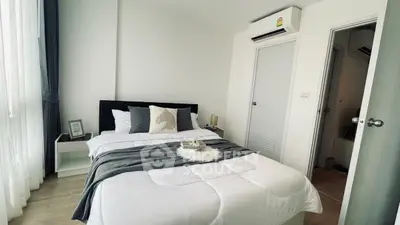 Cozy bedroom with modern decor and natural light