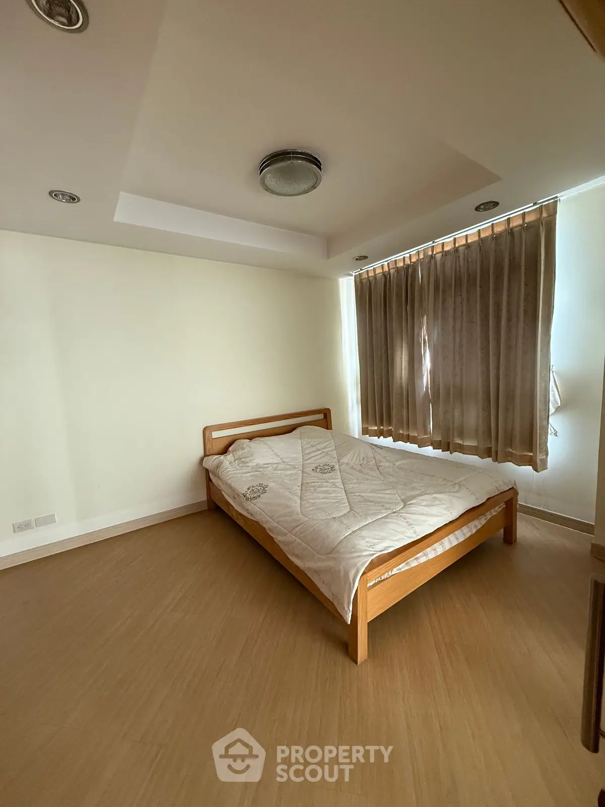 Cozy bedroom with natural light and minimalist decor
