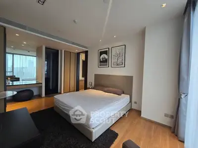 Spacious modern bedroom with large windows and elegant decor