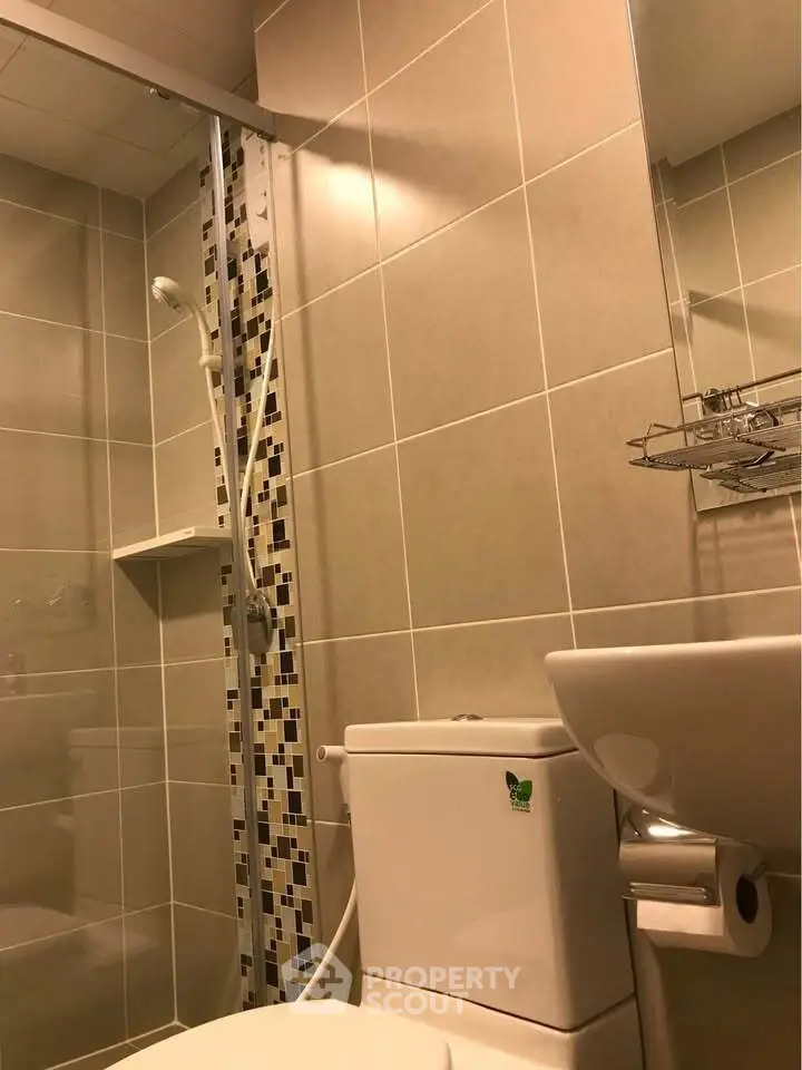 Modern bathroom with sleek tiles and contemporary fixtures