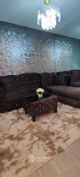 Luxurious living room with plush brown sectional sofa and elegant decor