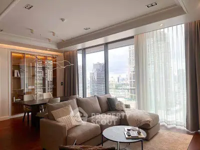 Luxurious living room with stunning city view, modern furniture, and elegant decor in high-rise apartment.
