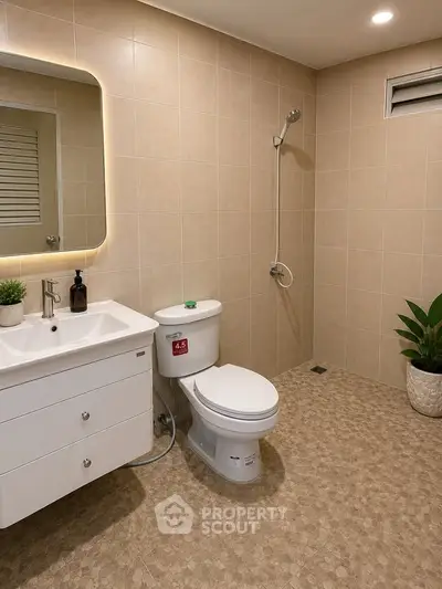 Modern bathroom with sleek fixtures and minimalist design, featuring a wall-mounted shower and elegant vanity.