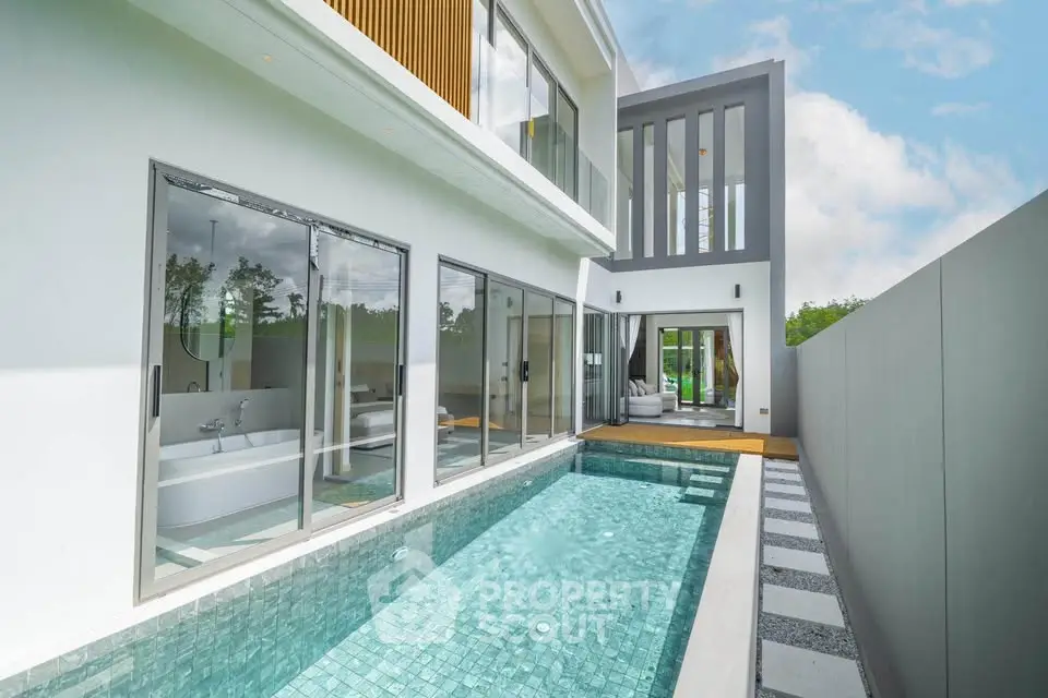 Luxurious modern villa with private pool and sleek architectural design.