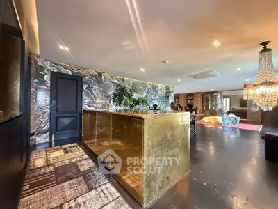 Luxurious living room with elegant decor and stunning chandelier