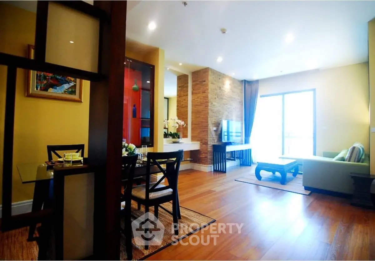 Spacious modern living room with wooden flooring and stylish decor