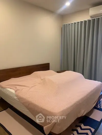 Cozy bedroom with modern decor and soft lighting