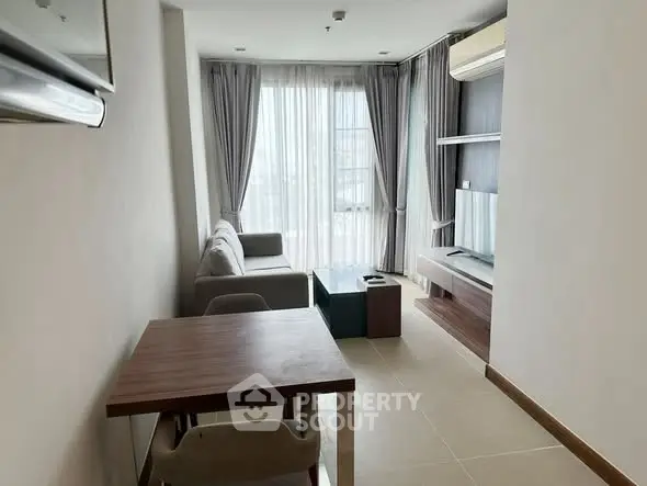 Modern living room with sleek furniture and natural light