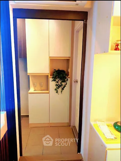 Modern interior hallway with sleek storage cabinets and elegant decor