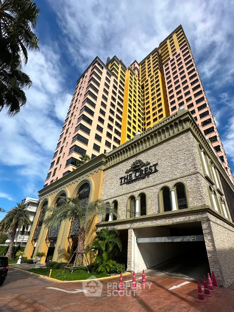 Stunning high-rise building with unique architecture and lush landscaping