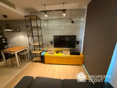 Modern living room with stylish decor and entertainment setup