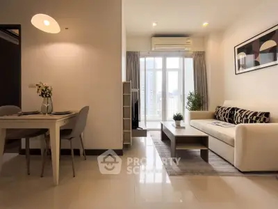 Modern living room with stylish decor and natural light in a high-rise apartment.
