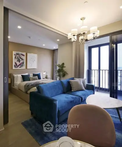 Luxurious modern bedroom with elegant decor and spacious balcony view.
