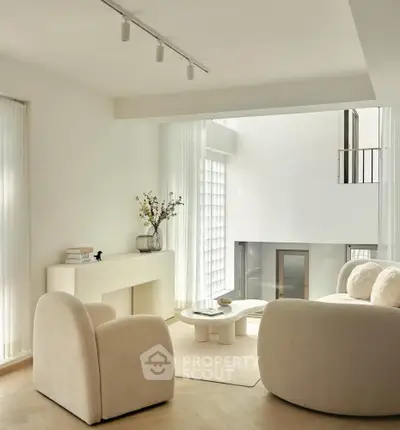 Luxurious modern living room with elegant furniture and natural light