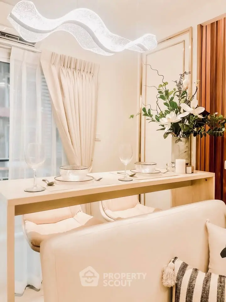 Elegant dining area with modern lighting and stylish decor