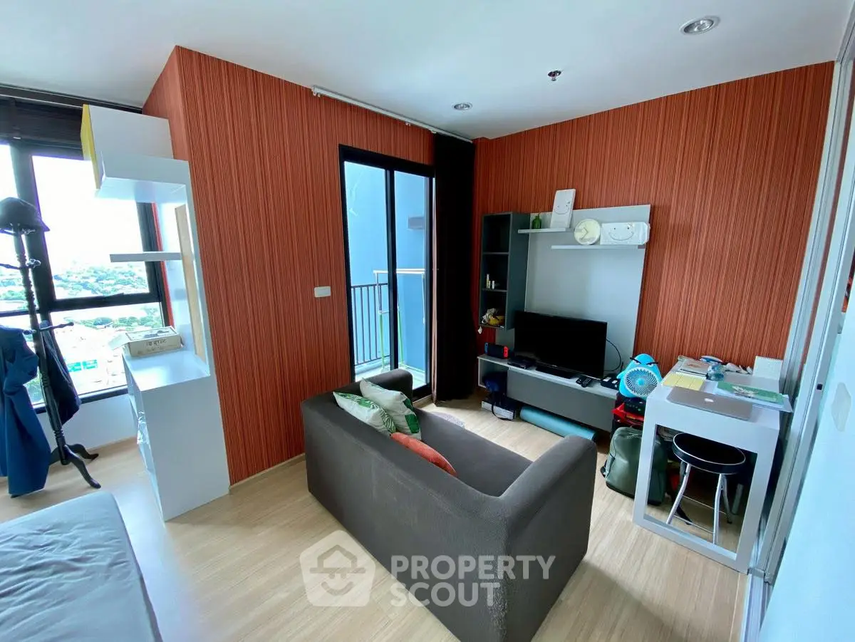 Modern living room with balcony view and stylish decor