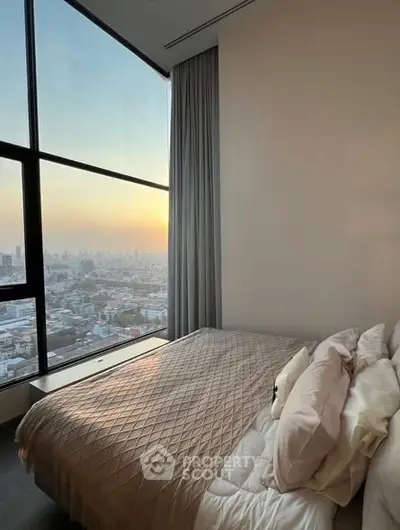 Luxurious bedroom with stunning city view and elegant decor