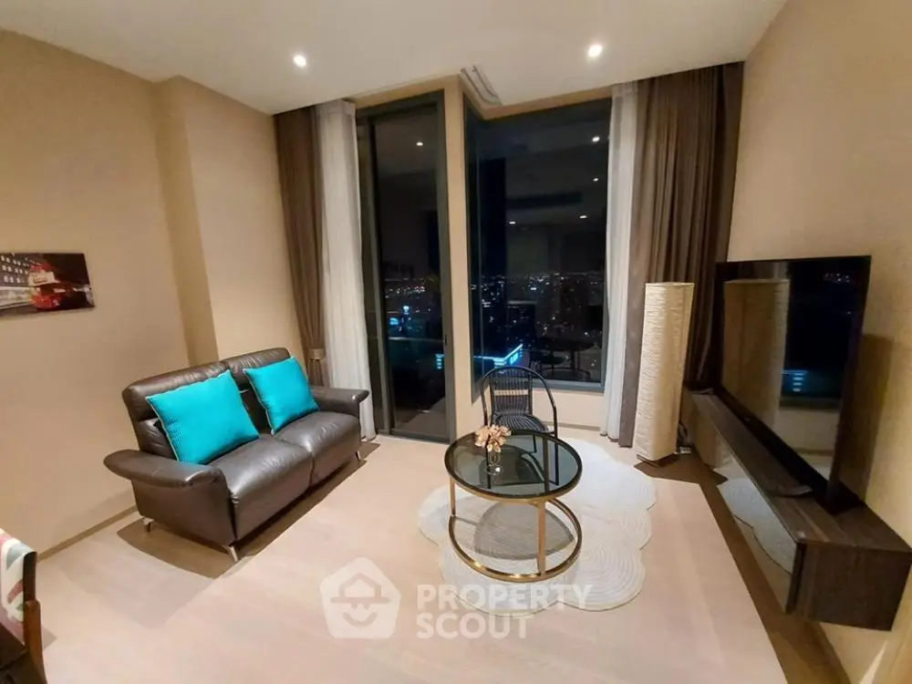 Luxurious living room with city view, modern furniture, and elegant decor.
