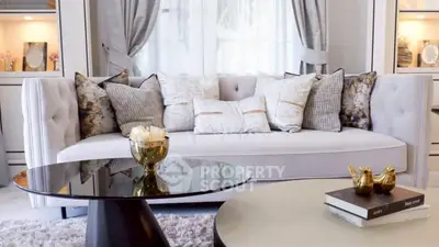 Elegant living room with plush sofa and stylish decor