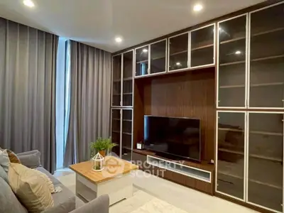 Modern living room with sleek cabinetry and cozy seating area