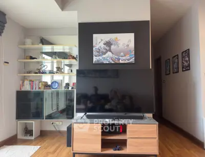 Modern living room with stylish decor and entertainment center