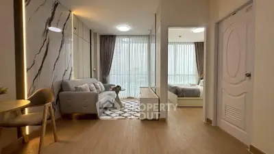 Modern apartment interior with stylish living room and cozy bedroom, featuring elegant decor and natural light.