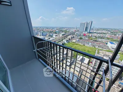 Stunning high-rise balcony with panoramic city view, perfect for urban living enthusiasts.