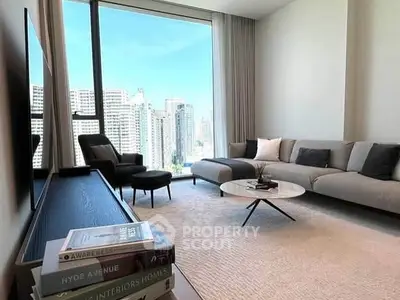 Luxurious living room with stunning city view and modern furniture.