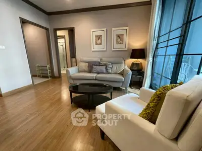 Stylish living room with modern furniture and wooden flooring