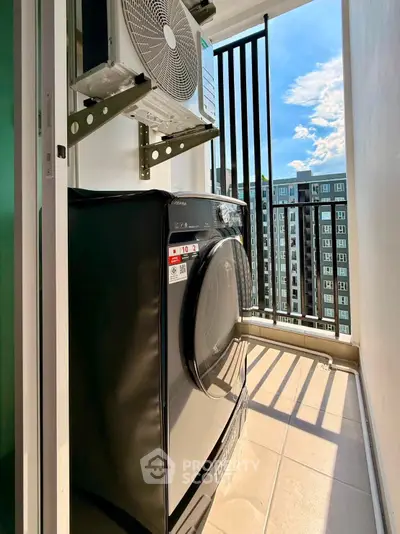 Modern apartment balcony with washing machine and city view, perfect for urban living.