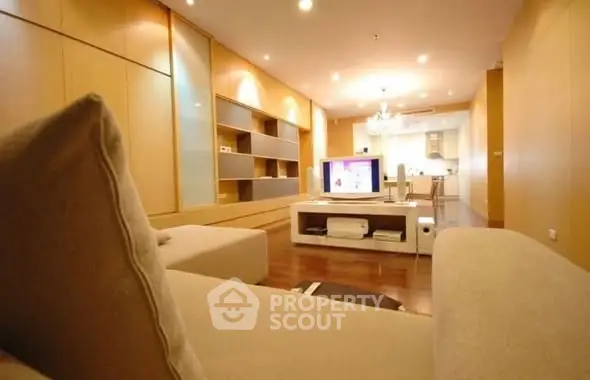 Spacious modern living room with elegant lighting and open layout