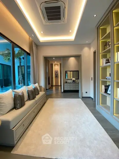 Luxurious modern living room with elegant decor and ample natural light