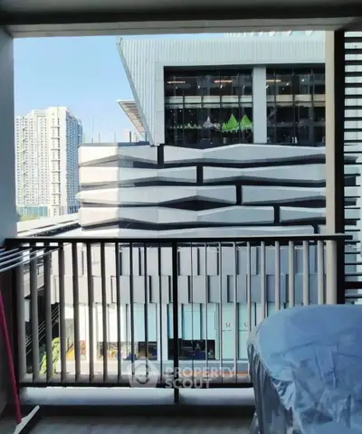 Modern balcony view with urban architecture and cityscape