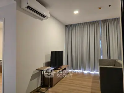 Modern living room with air conditioning and stylish furniture in a cozy apartment.