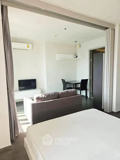 Modern studio apartment with open layout and stylish furniture