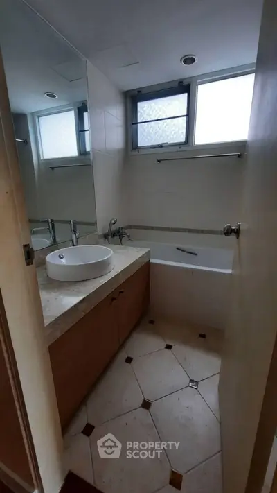 Cozy bathroom with modern fixtures and natural light
